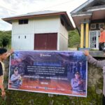 Pemasangan spanduk hotline